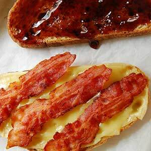 Bacon, cheese and mustard open-faced sandwich