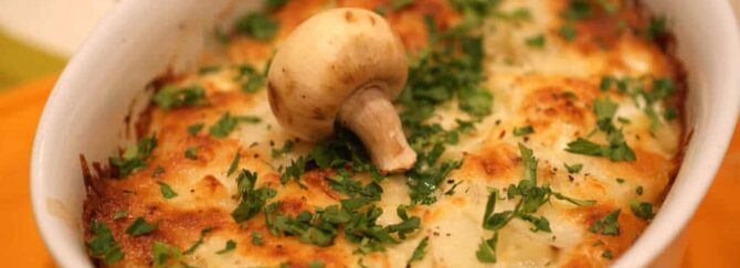 Potato baked pudding with mushrooms