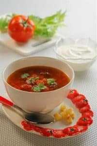 Cold tomato soup with tomato and red onion