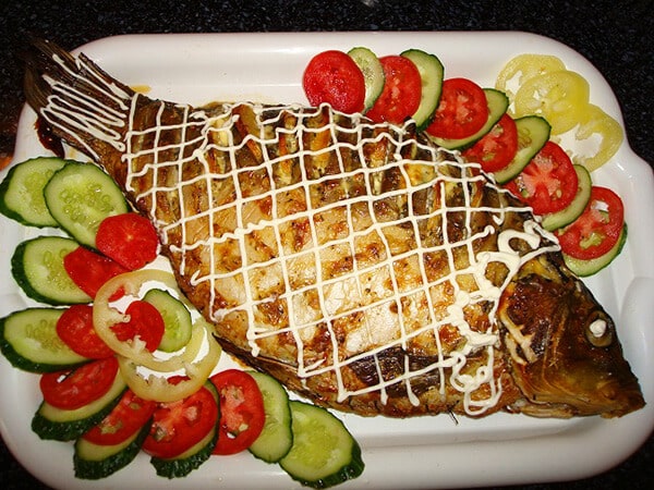 Fish with mushroom and carrot filling