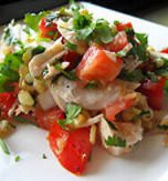 Fish salad with tomatoes and apples
