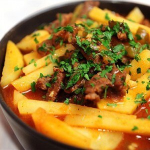 Stewed beef and potato with tomato sauce