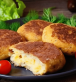 Mashed potato patties with meat (kartoplianyky)
