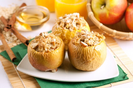 Baked apples stuffed with walnuts and raisins