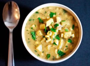 Potato soup with parsley and celery root