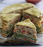 Layered omelet cake with vegetable stuffing