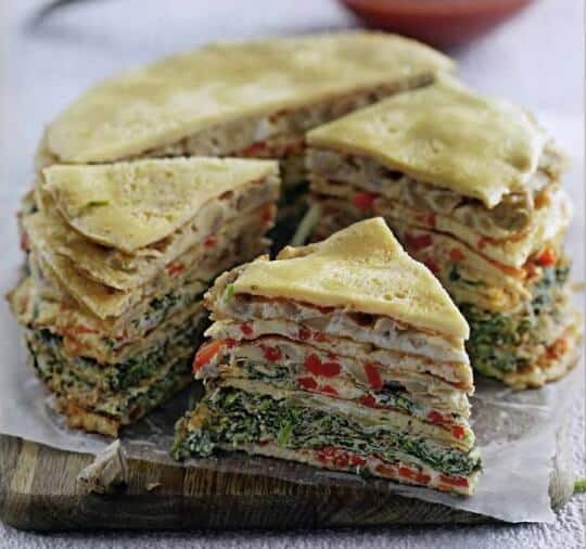 Layered omelet cake with vegetable stuffing