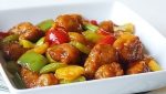 Fried pork with bell peppers and tomatoes