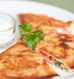 Pancakes with Brynza (Feta Cheese) and Tomatoes