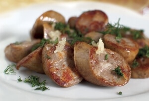 Pan-fried sausage with garlic and dill