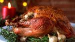 Roast chicken with mushroom, cheese, and breadcrumbs stuffing