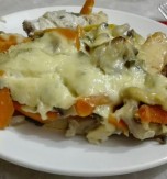 Roasted Fish with Mushrooms Under Cheese