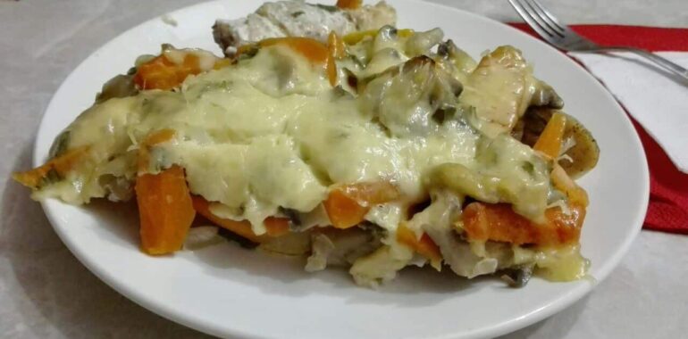 Roasted Fish with Mushrooms Under Cheese