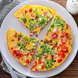 Scrambled eggs with sausage, bell pepper, and spring onion