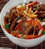 Warm chicken liver, onion, carrot, and pepper salad