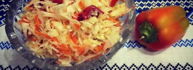 Cabbage, carrot, bell pepper, and onion salad