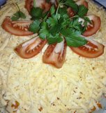 Layered salad with chicken, potato and champignons