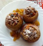 Baked apples stuffed with walnuts, raisins, and dried apricots