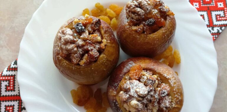 Baked apples stuffed with walnuts, raisins, and dried apricots
